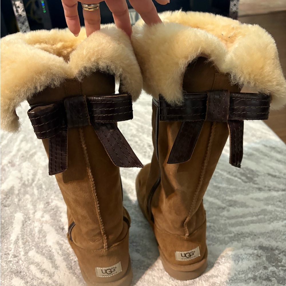 UGG Tan Boots with Shearling and Bows , wear only once good as new